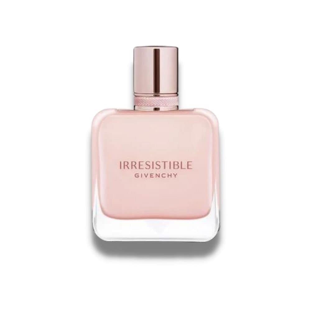 Roze parfumfles. Opschrift: Irresistible Givenchy. Rechthoekige fles met roze inhoud en roségouden dop.