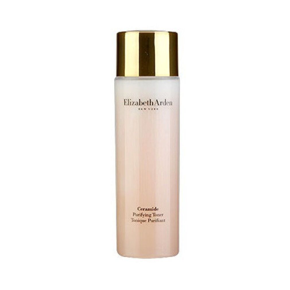 Cilindrische fles met gouden dop. Opschrift: Elizabeth Arden, Ceramide Purifying Toner. Roze vloeistof zichtbaar.