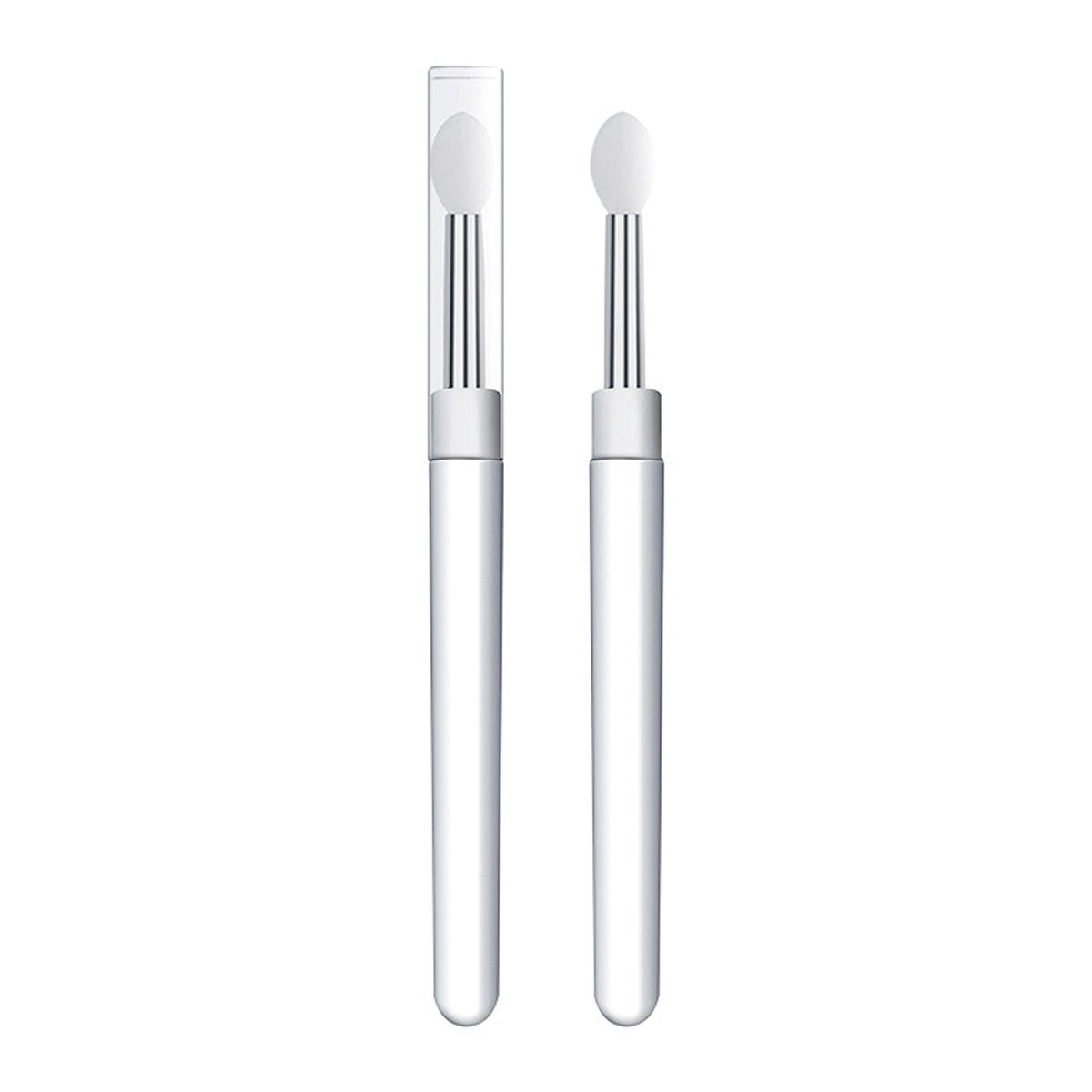 Deux applicateurs à manche transparent et embout en silicone blanc, dont un avec capuchon de protection.