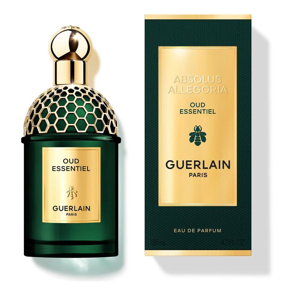 Flacon de parfum vert et boîte. Bouchon doré, texte doré. Sur la boîte : "Absolus Allegoria Oud Essentiel" et "Guerlain Paris".