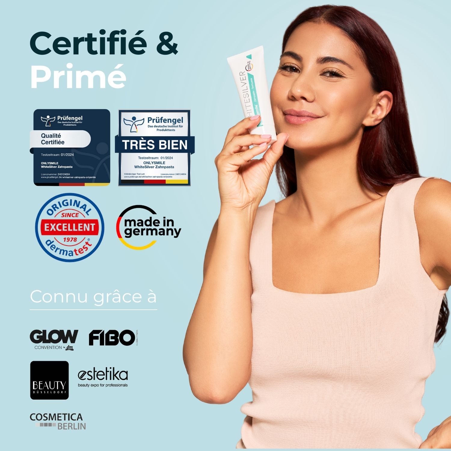 Femme tenant du dentifrice. Certifications et logos. Dentifrice Whitesilver. Fabriqué en Allemagne.