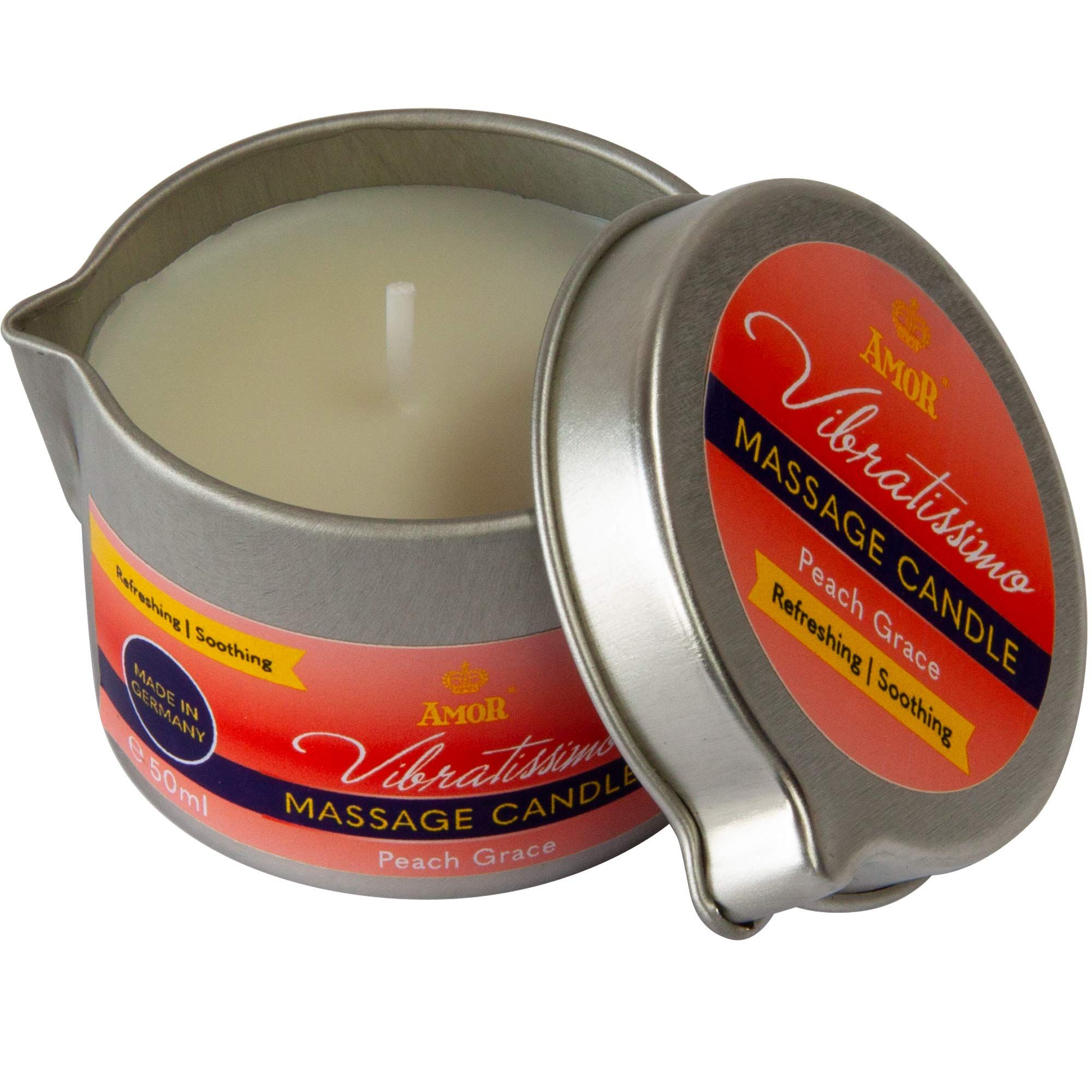Bougie de massage Vibratissimo Peach Grace en boîte métallique, ouverte.