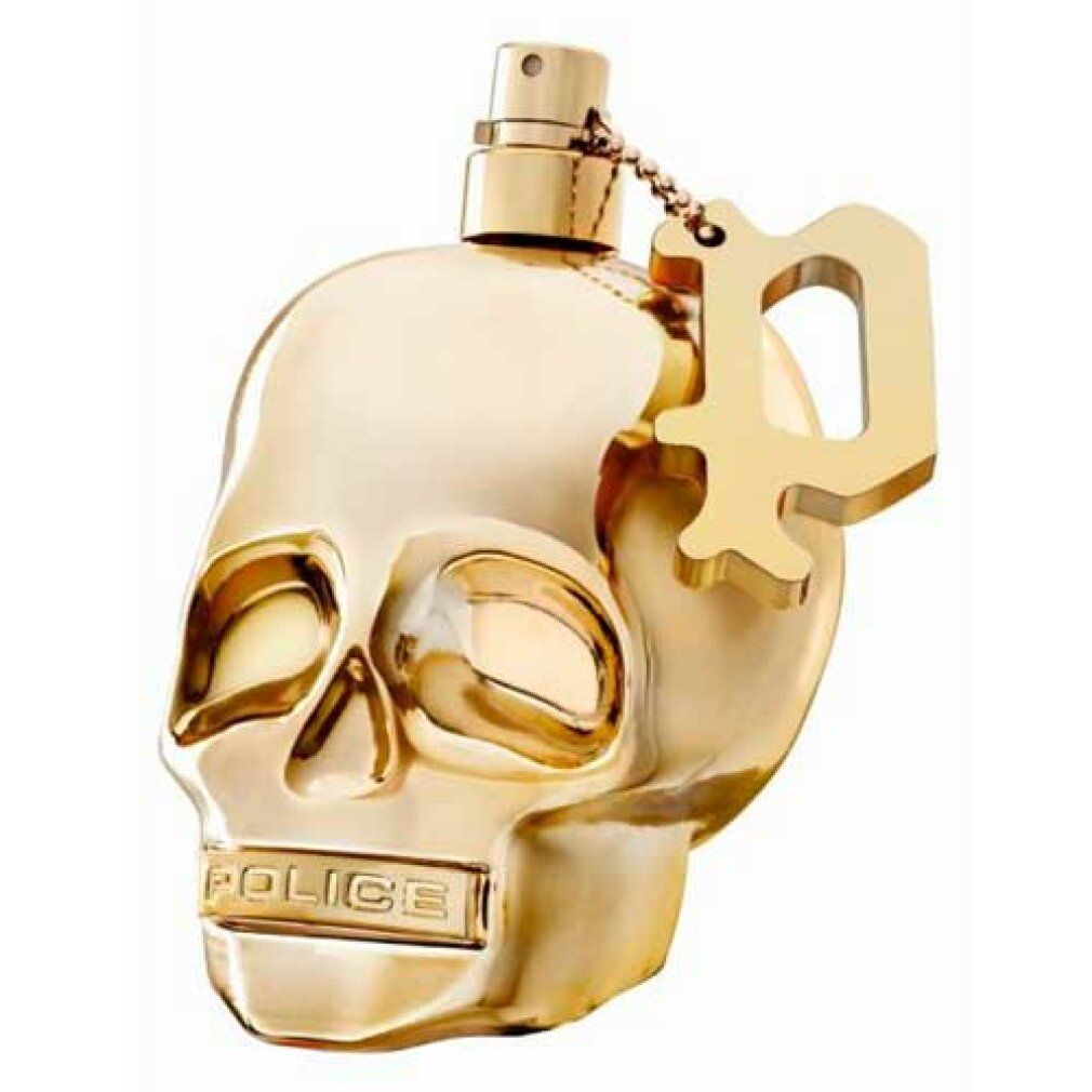 Flacon de parfum doré en forme de tête de mort avec pendentif. Inscription "Police" sur le menton.