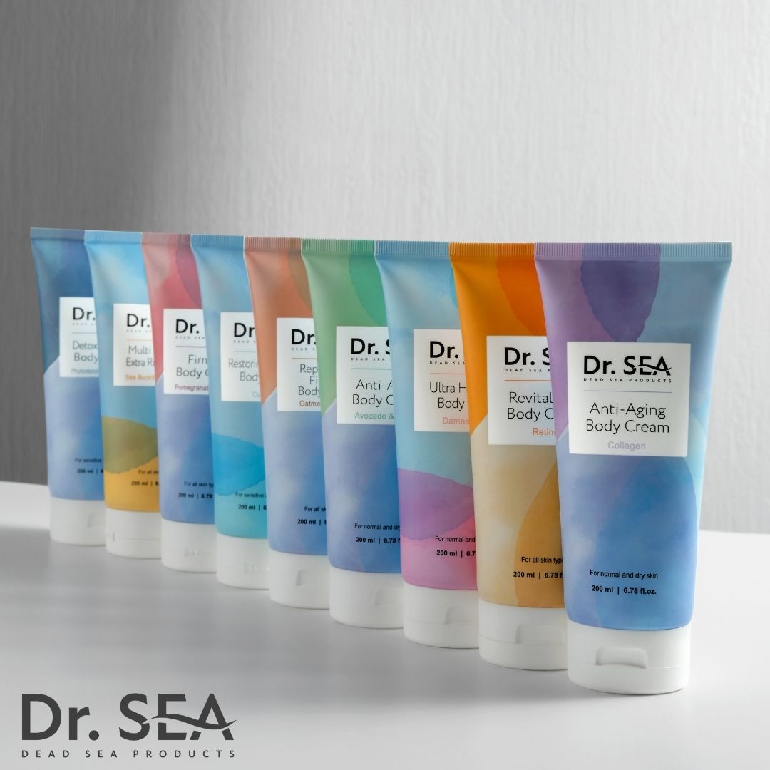 Rangée de tubes de crème. Inscription : Dr. SEA. Différents noms de produits et couleurs.
