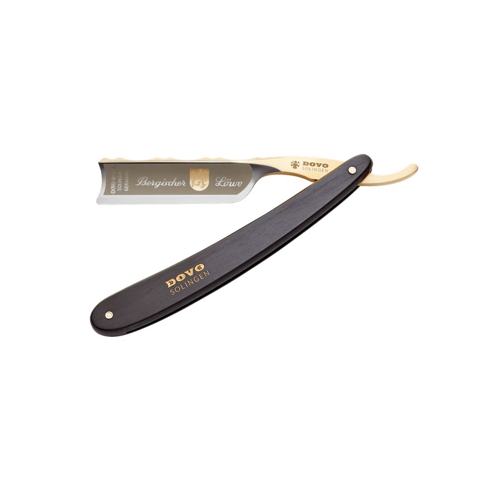 Rasoir avec lame ouverte. Lame dorée avec inscription 'Bergischer Löwe' et 'DOVO Solingen'.