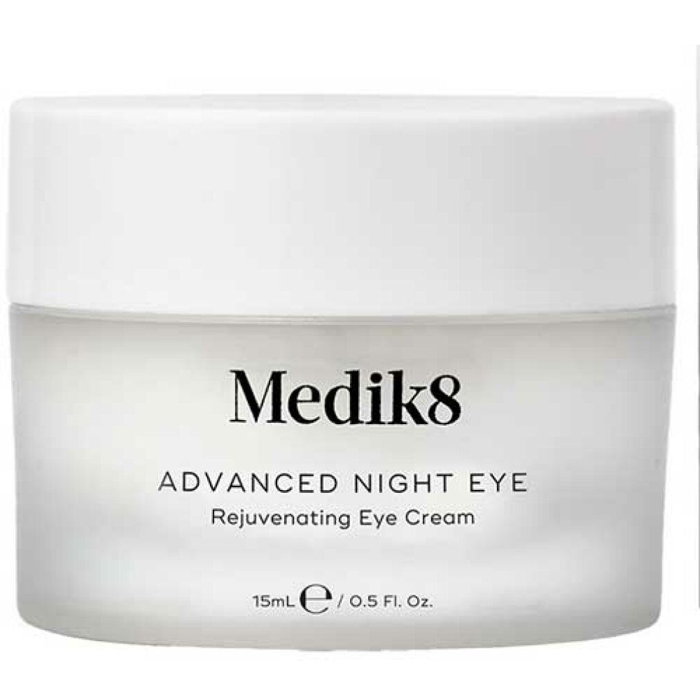 Pot blanc Medik8 Advanced Night Eye. Texte noir: Rejuvenating Eye Cream. 15ml. Vue rapprochée.