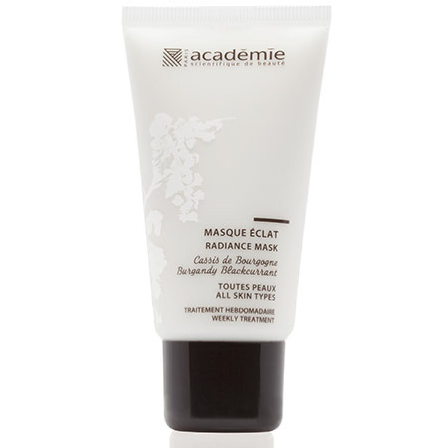 Tube blanc et noir. Inscription: Académie, Masque Éclat, Radiance Mask, Cassis de Bourgogne, Burgandy Blackcurrant, Toutes Peaux, All Skin Types.