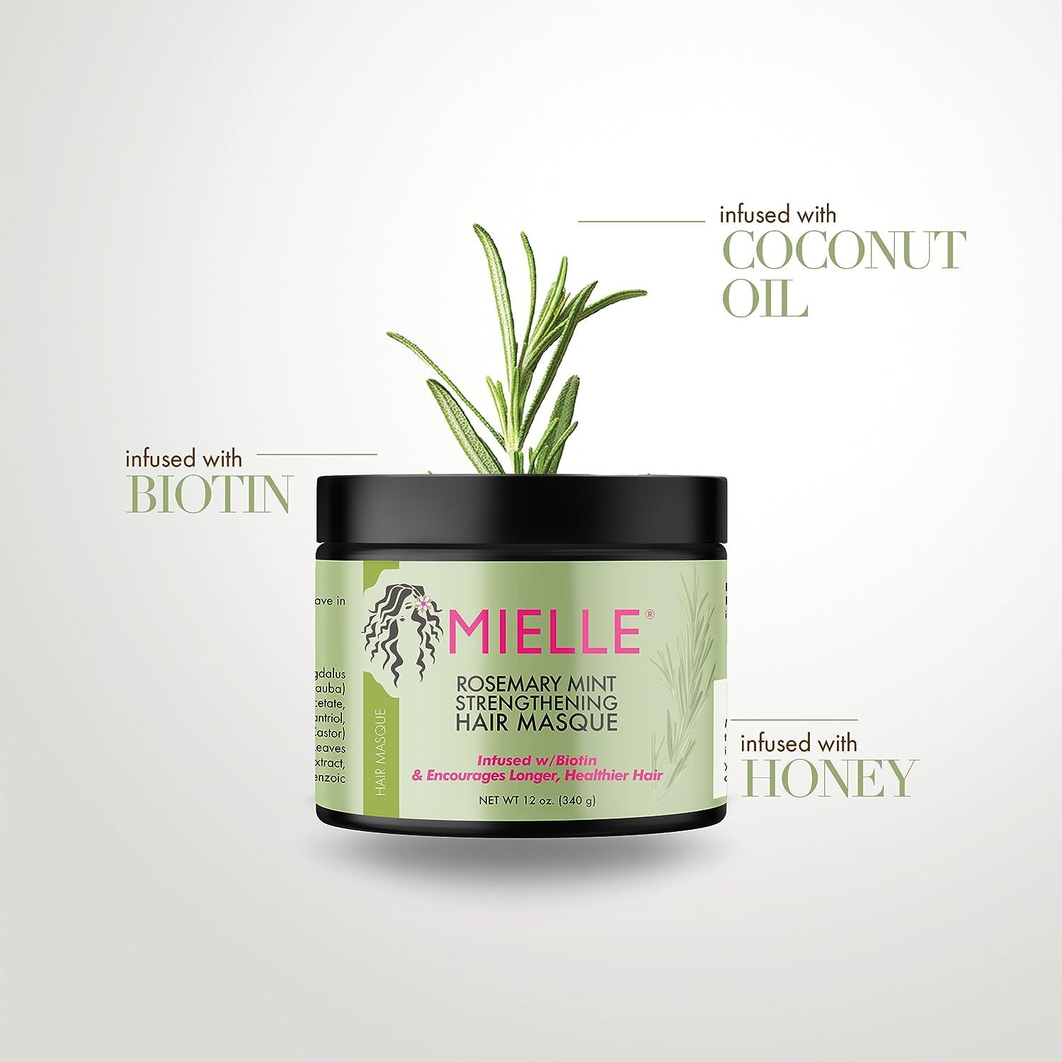 Mielle Rosemary Mint Strengthening Hair Masque met rozemarijntakje, verrijkt met biotine, kokosolie en honing.