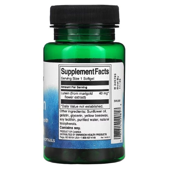 Dos du flacon vert. Inscription: Supplement Facts. Lutein (extrait de fleur de souci) 40 mg. Contient du soja. Meilleur avant 11/23.