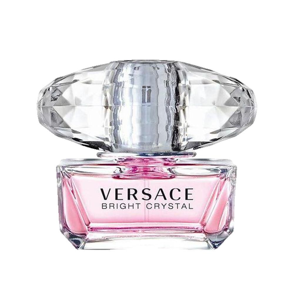 Parfumfles. Rechthoekige roze houder met transparante, facetgeslepen dop. Opschrift: VERSACE BRIGHT CRYSTAL.