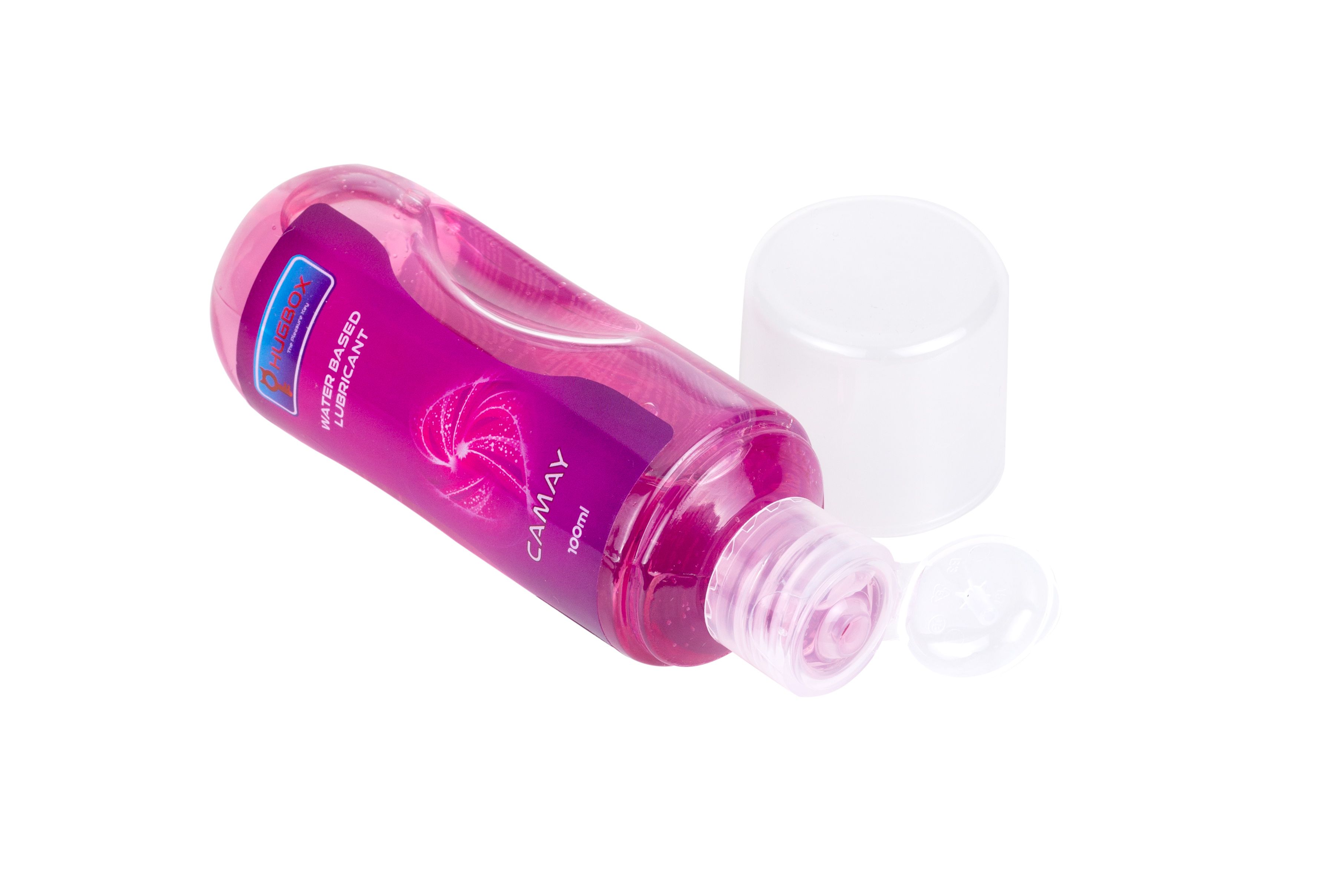 Bouteille de liquide rose avec couvercle ouvert. Étiquette avec texte.