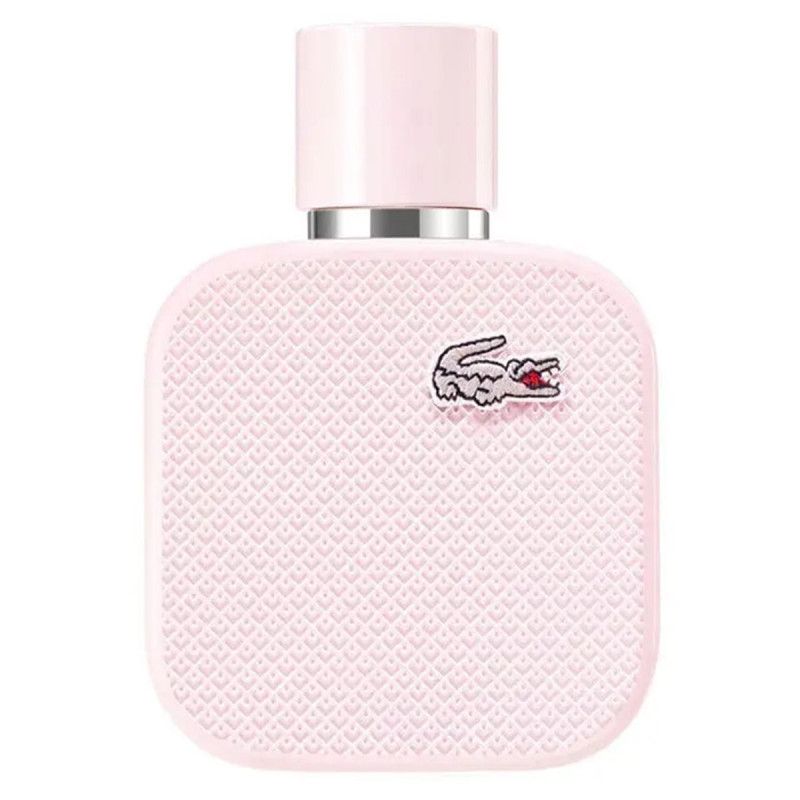Flacon rose Lacoste L.12.12 Eau de Parfum avec logo crocodile.