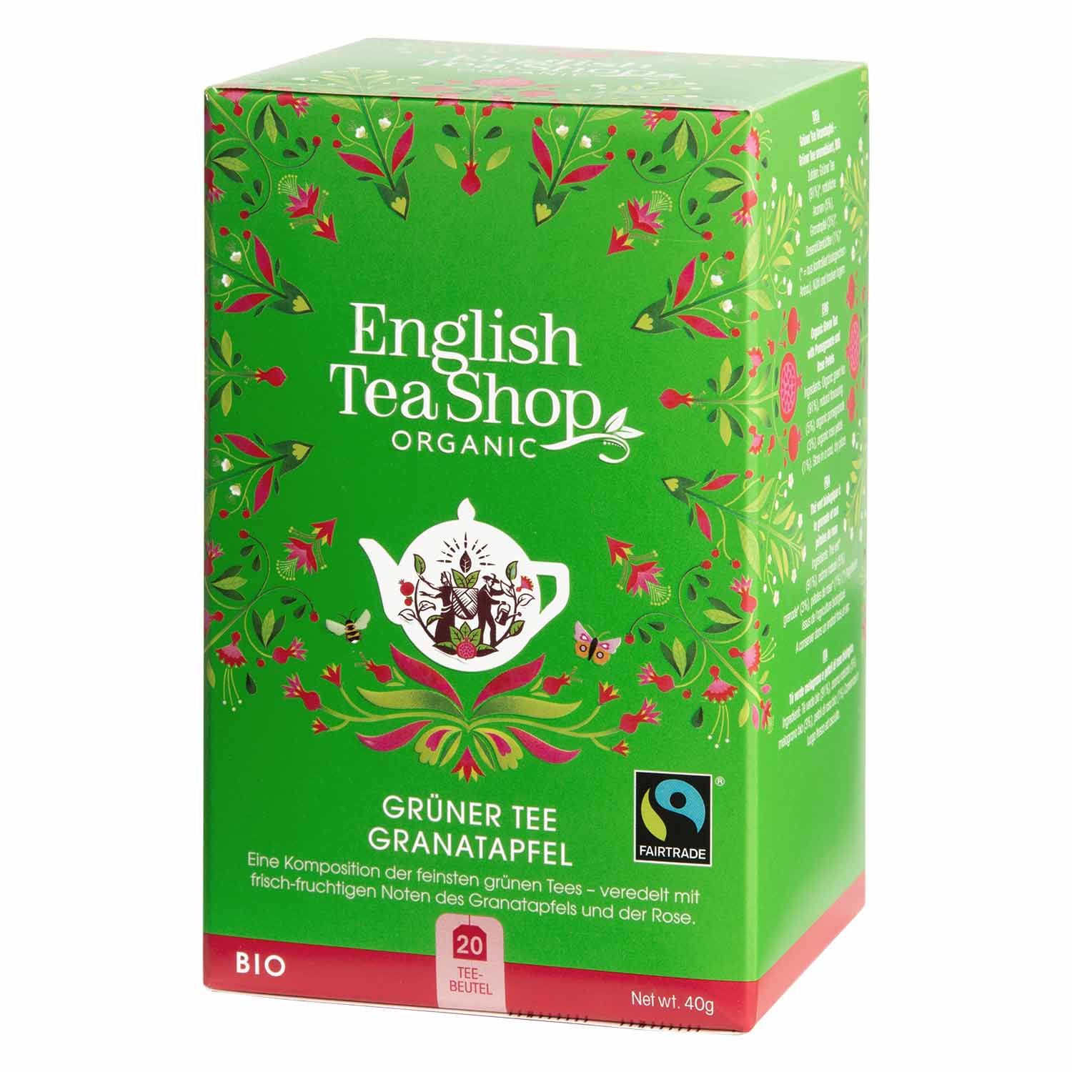 Groene doos met "English Tea Shop Organic" logo en "Grüner Tee Granatapfel" opdruk. Bevat 20 theezakjes. Fairtrade keurmerk.