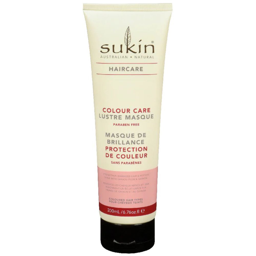 Crèmetube met Sukin. Opschrift: Colour Care Lustre Masque. Zwarte dop, roze en wit design. Inhoud 200ml.