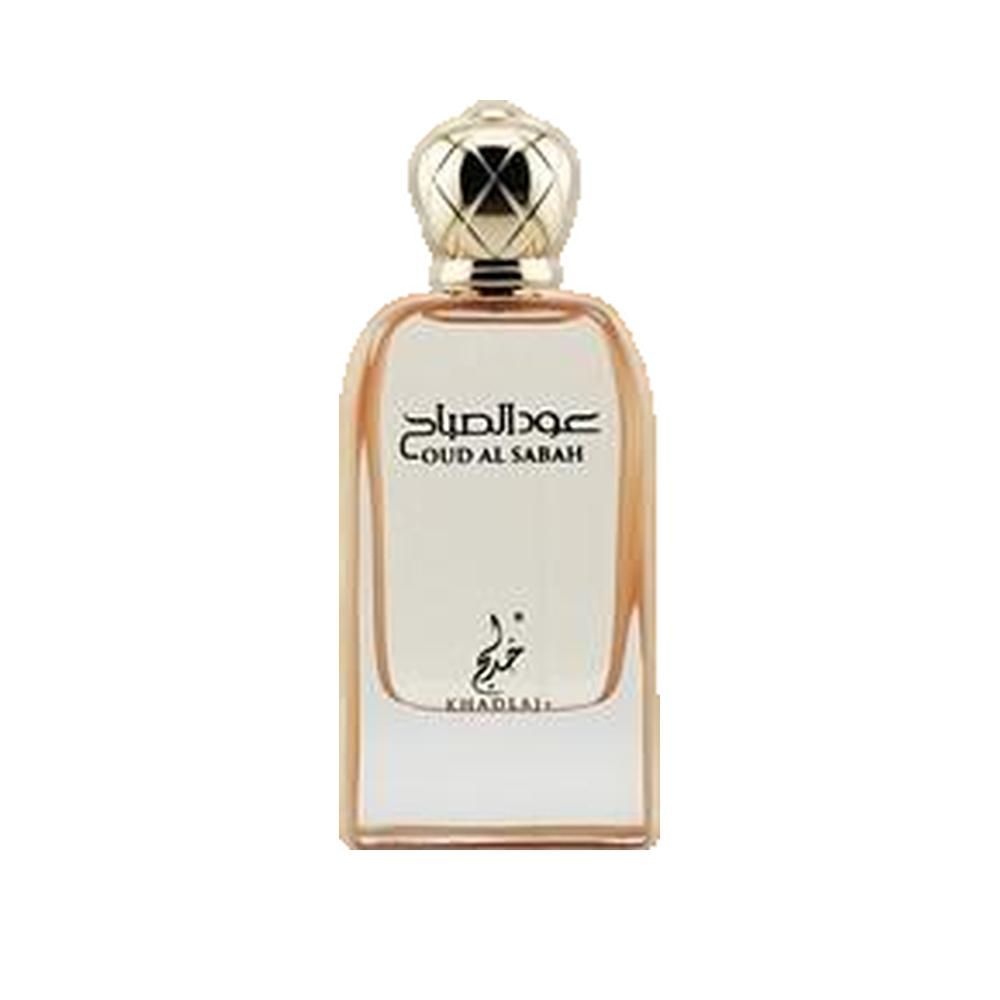 Flacon de parfum doré avec bouchon doré. Écriture arabe sur le flacon. Fond de flacon transparent.