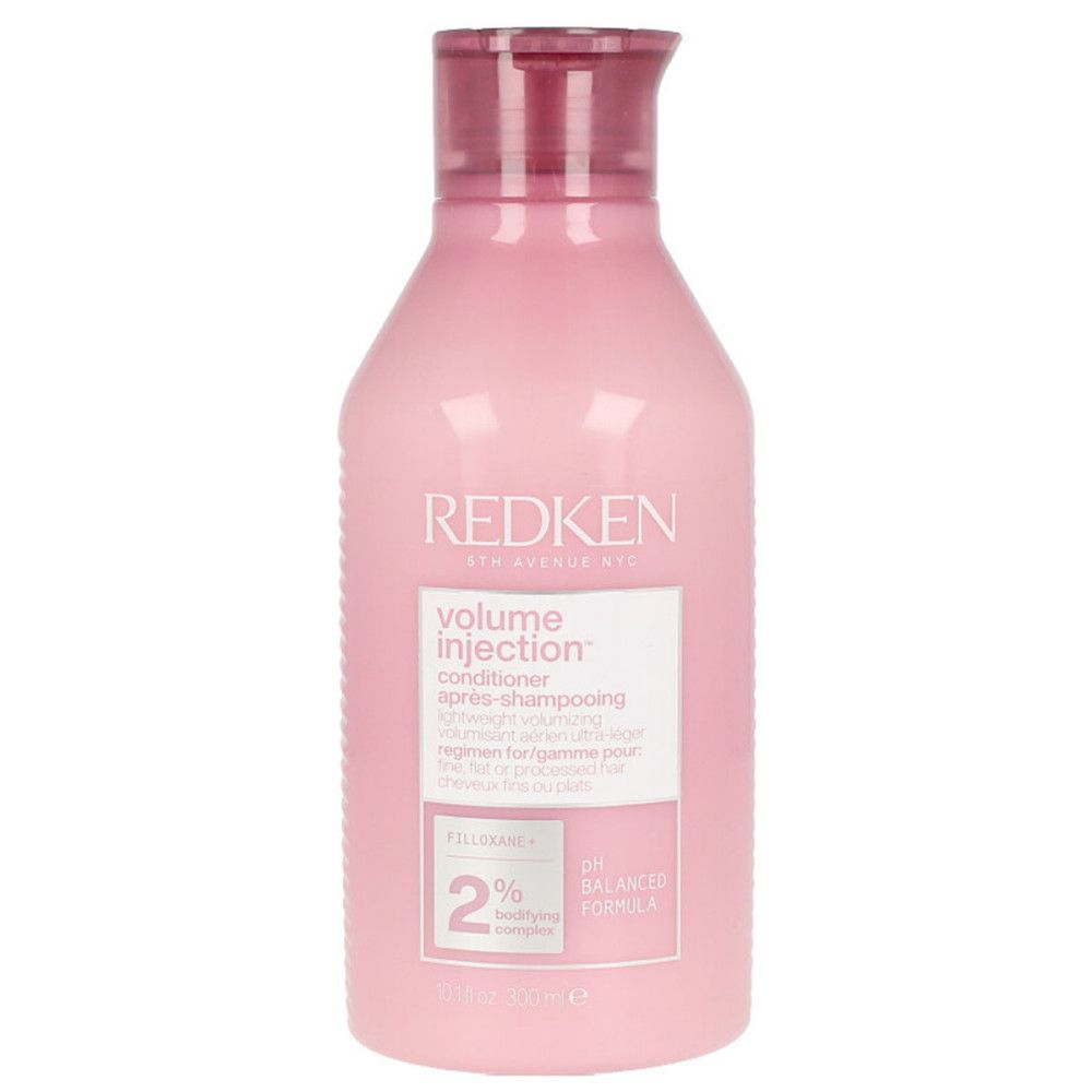Flacon rose Redken Volume Injection Conditioner. Étiquette avec texte. Formule pH équilibrée. 300ml.