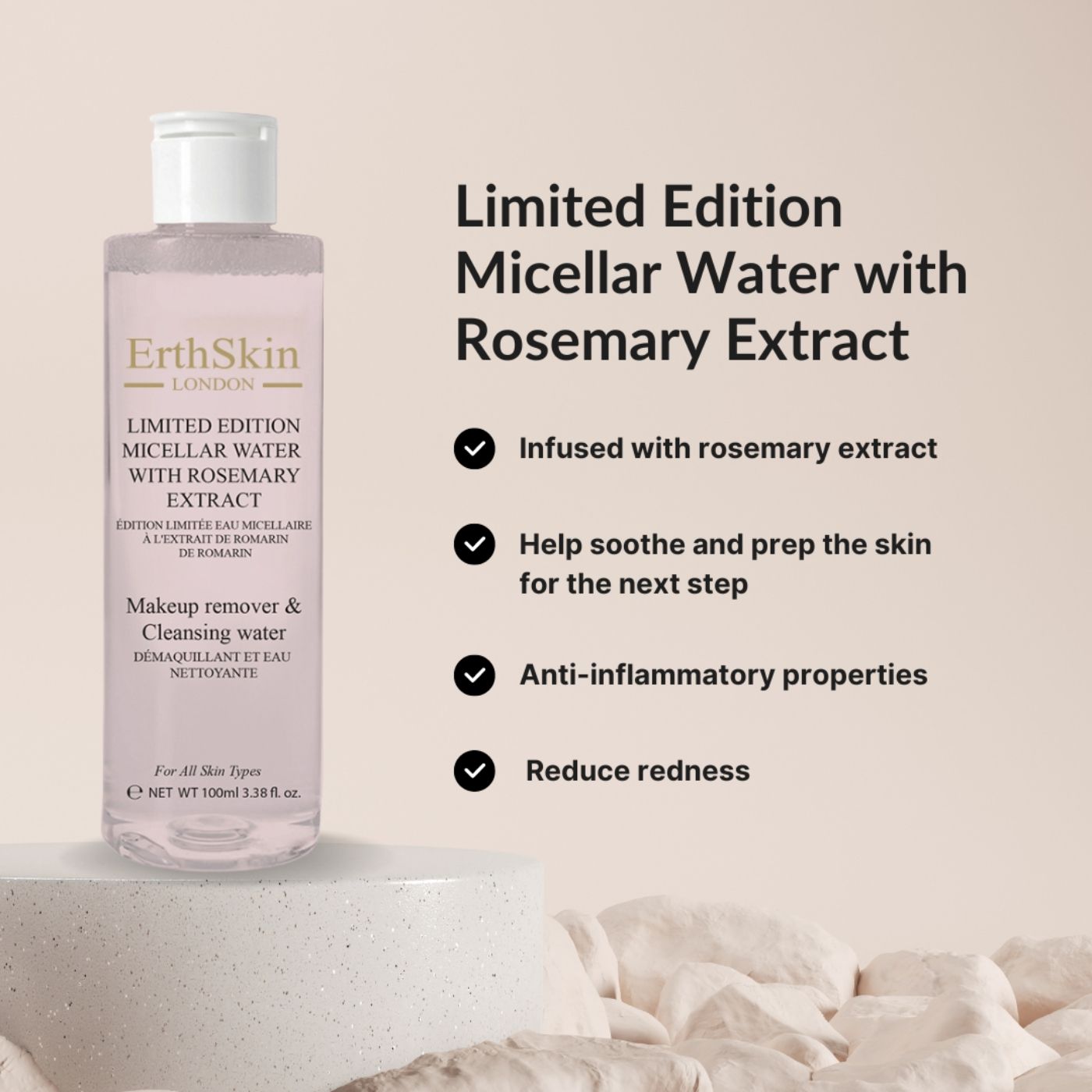 Flacon avec bouchon blanc et étiquette. Texte: Edition limitée eau micellaire au romarin. Texte supplémentaire avec avantages.