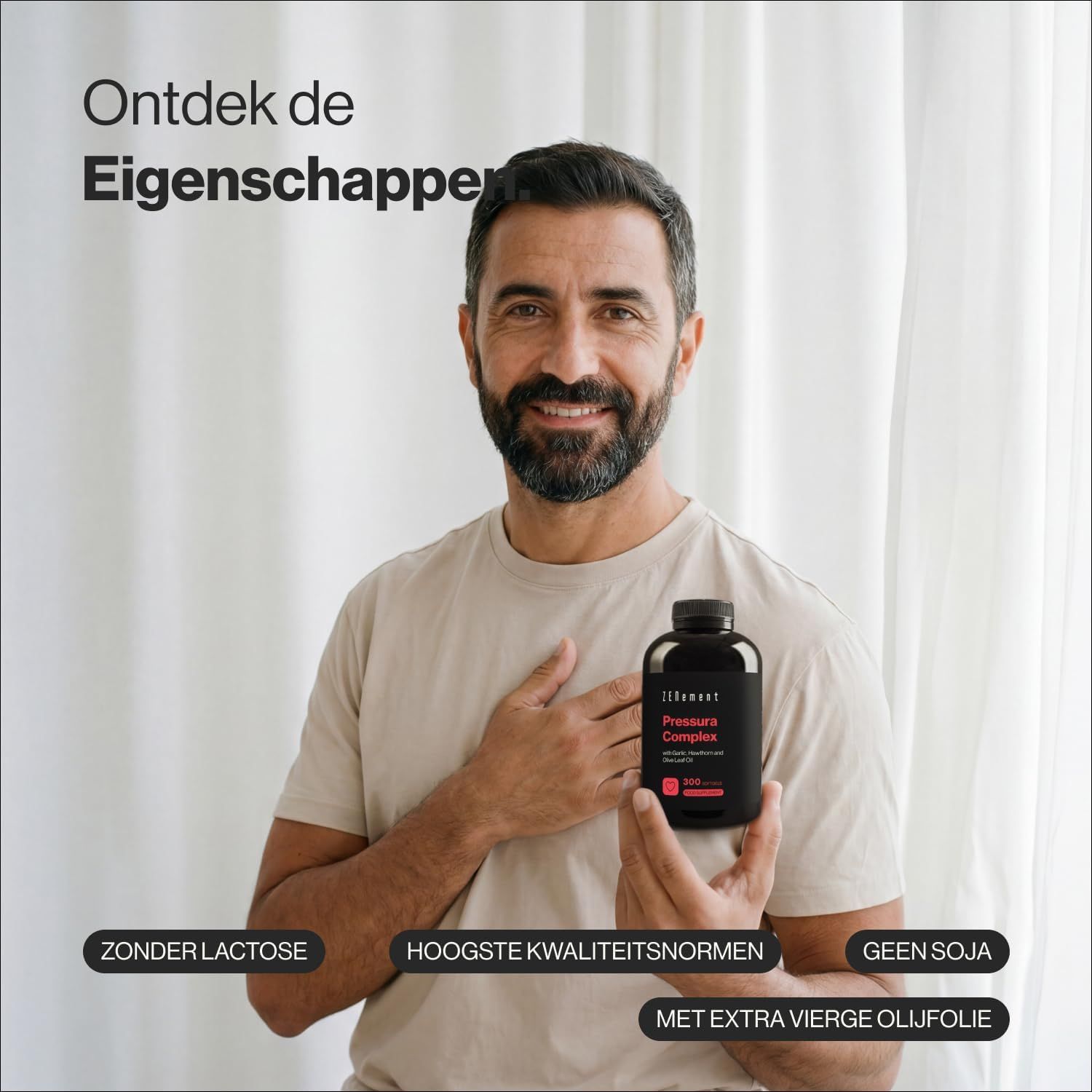 Man houdt zwarte fles met supplement 'Pressure Complex'. Kenmerken: Zonder lactose, hoogste kwaliteitsnormen, geen soja, met olijfolie.