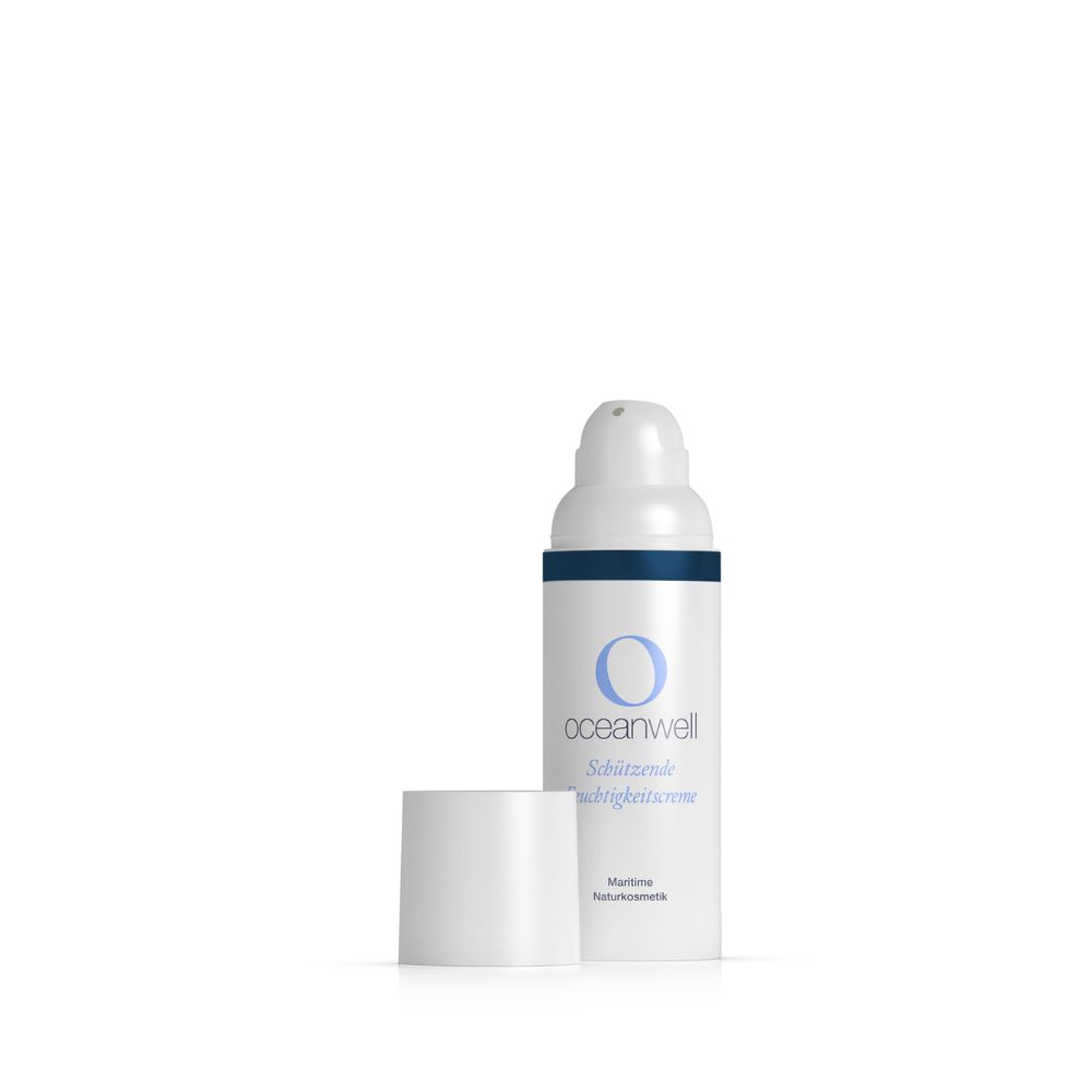 Witte fles met blauwe ring en tekst. Deksel ernaast.