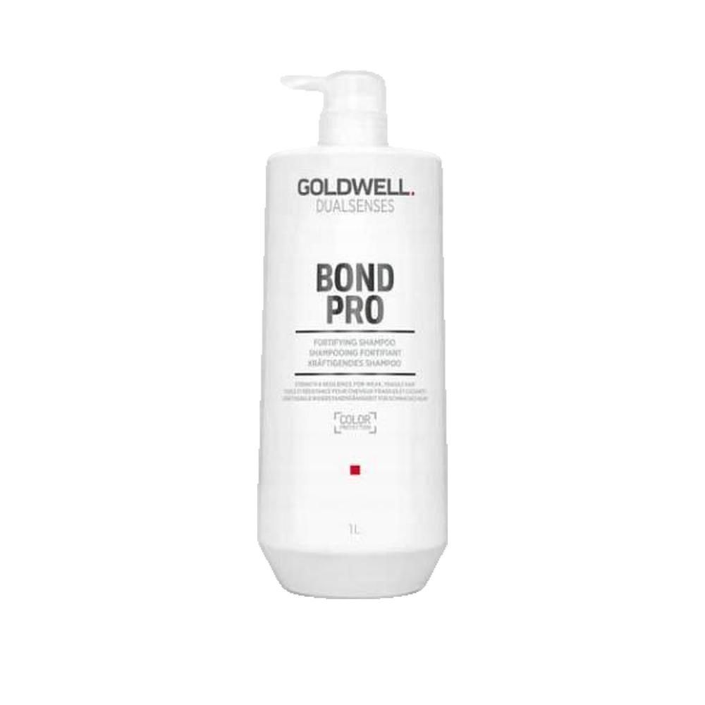 Witte fles met pomp. Opschrift: GOLDWELL DUALSENSES BOND PRO. 1L. Kleurmarkering.