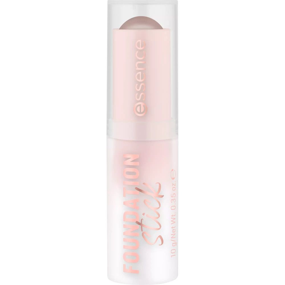 Essence Foundation Stick. Roze-witte verpakking met productnaam en merklogo. Transparante bovenkant.