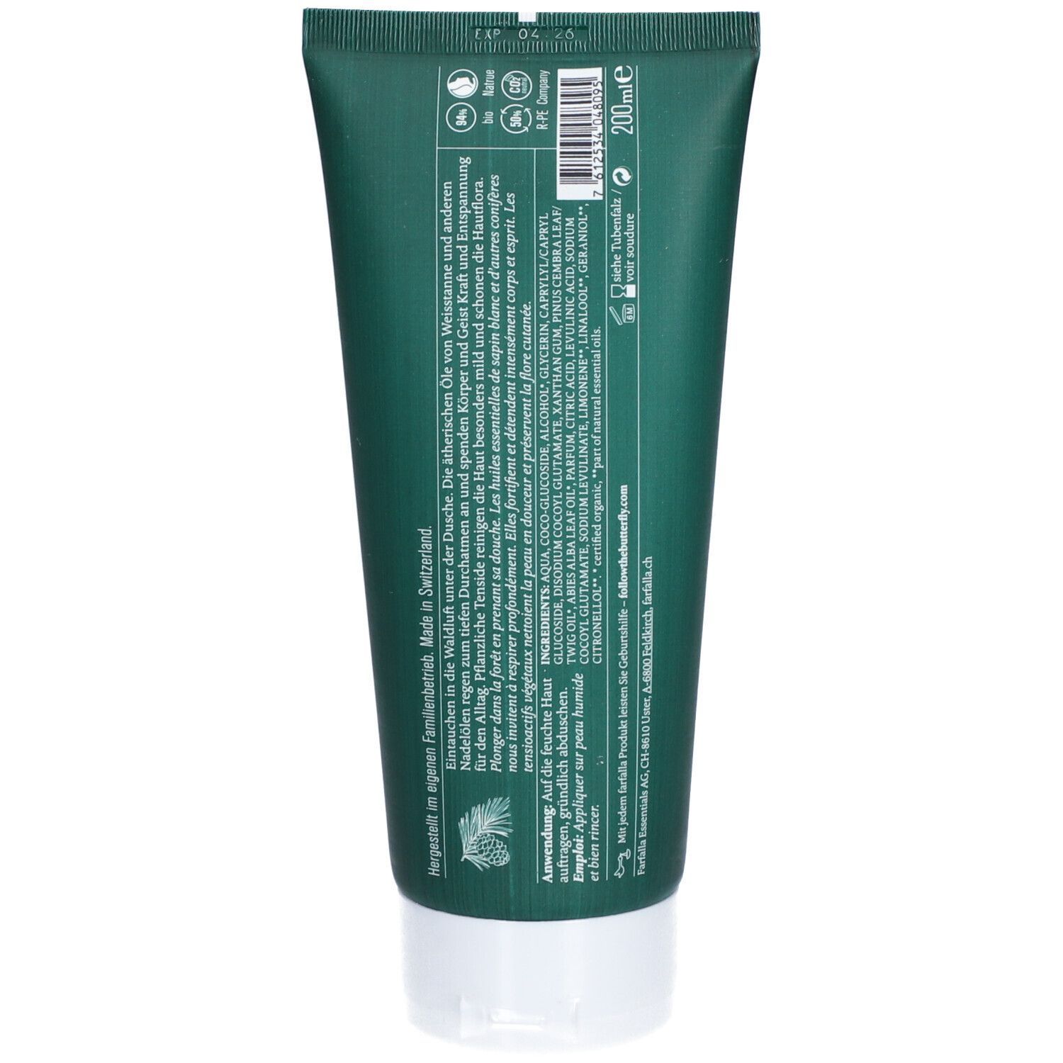 Achterkant van de groene tube. Tekst in meerdere talen. Ingrediënten en fabrikantinfo. Witte dop.