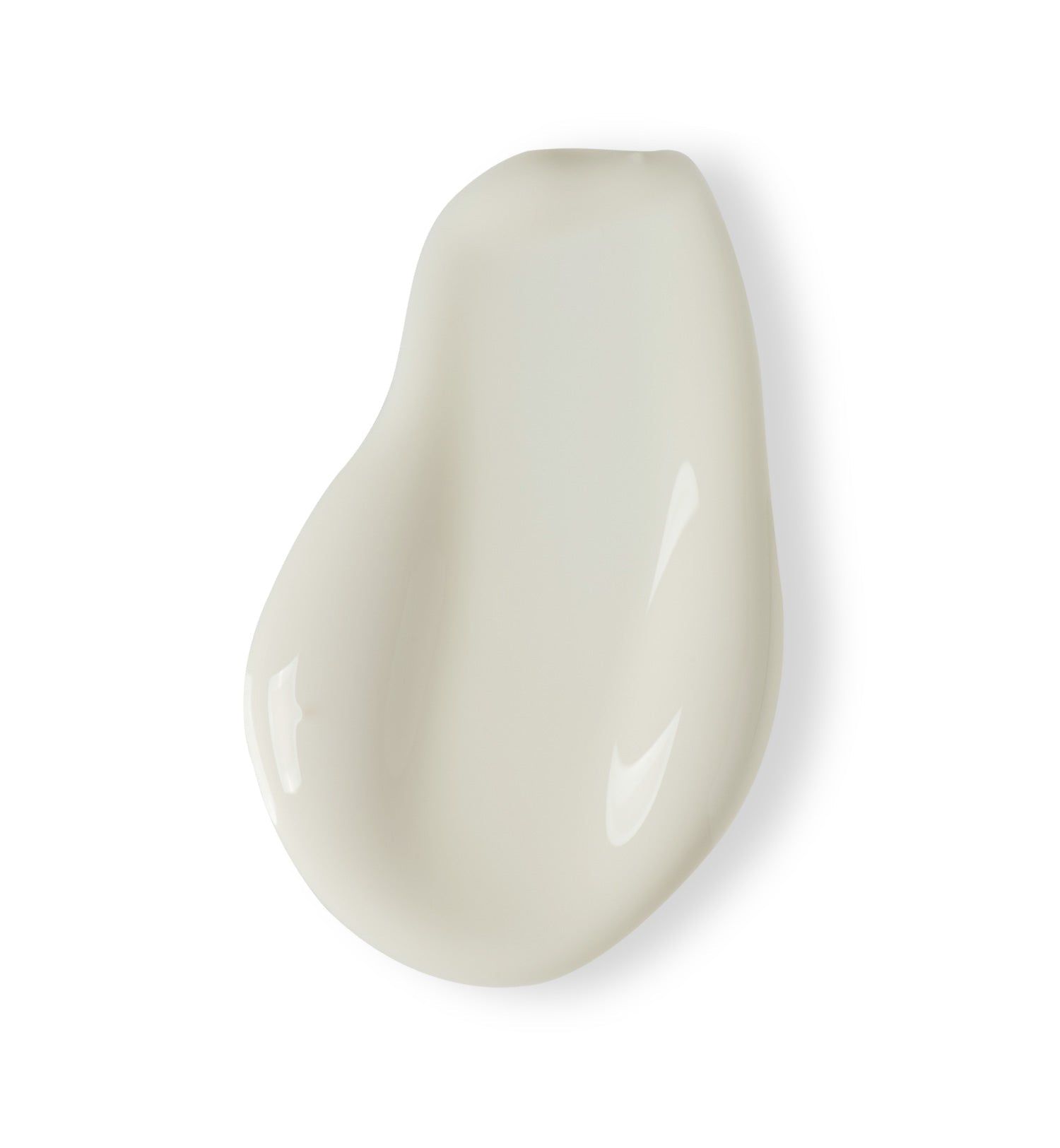 Witte crème-emulsie op witte achtergrond. Gladde textuur, druppelvormig.