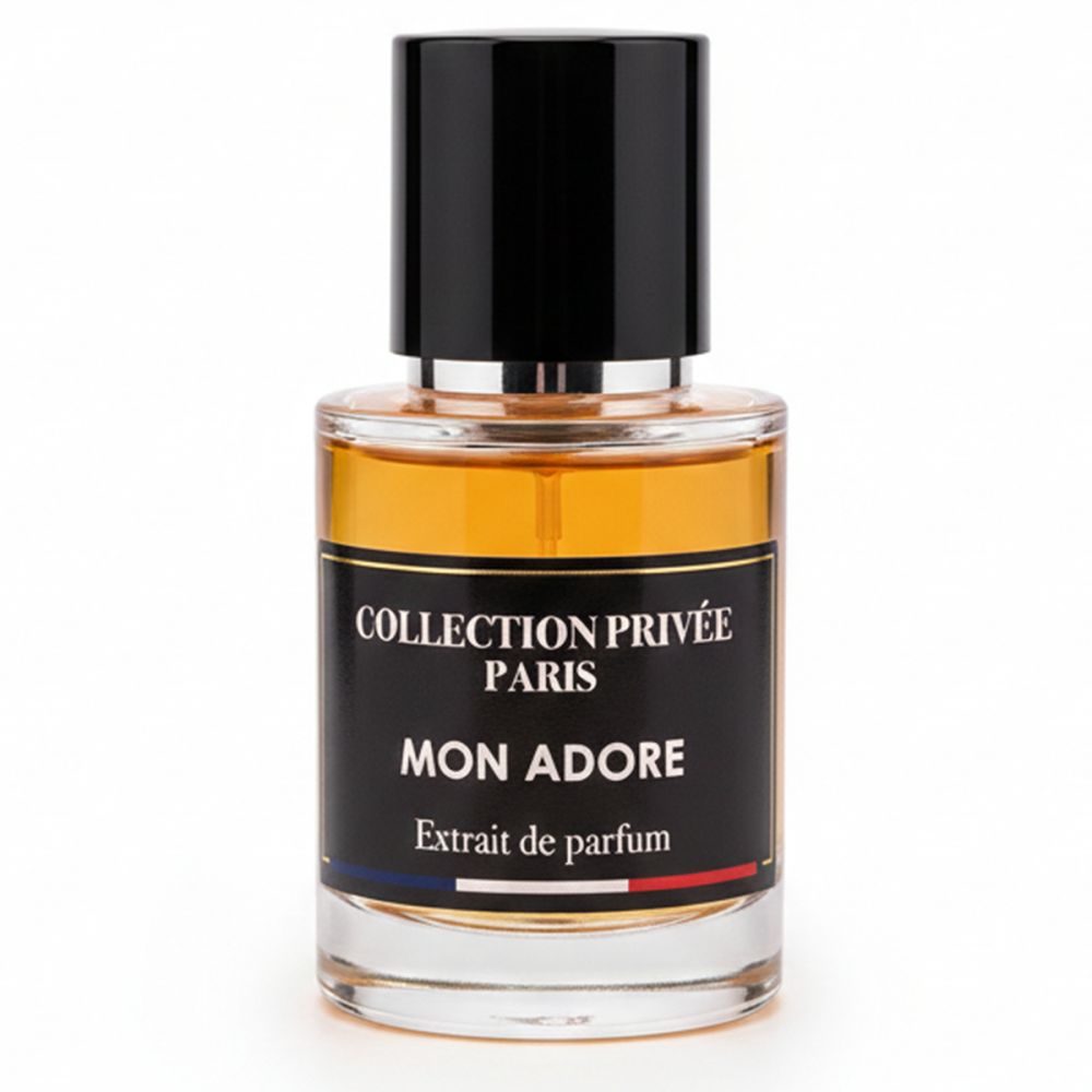 Flacon de parfum avec bouchon noir. Inscription : Collection Privée Paris, Mon Adore, Extrait de parfum. Drapeau français.