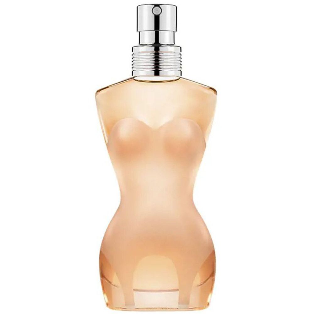 Flacon de parfum en forme de corps féminin. Couleur beige translucide. Vaporisateur argenté. Design classique.