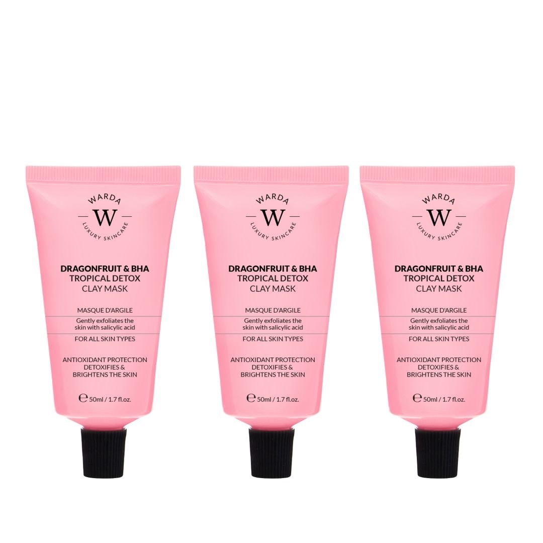 Trois tubes roses avec bouchon noir. Texte: Dragonfruit & BHA Tropical Detox Clay Mask, Warda Luxury Skincare. Sur fond blanc.