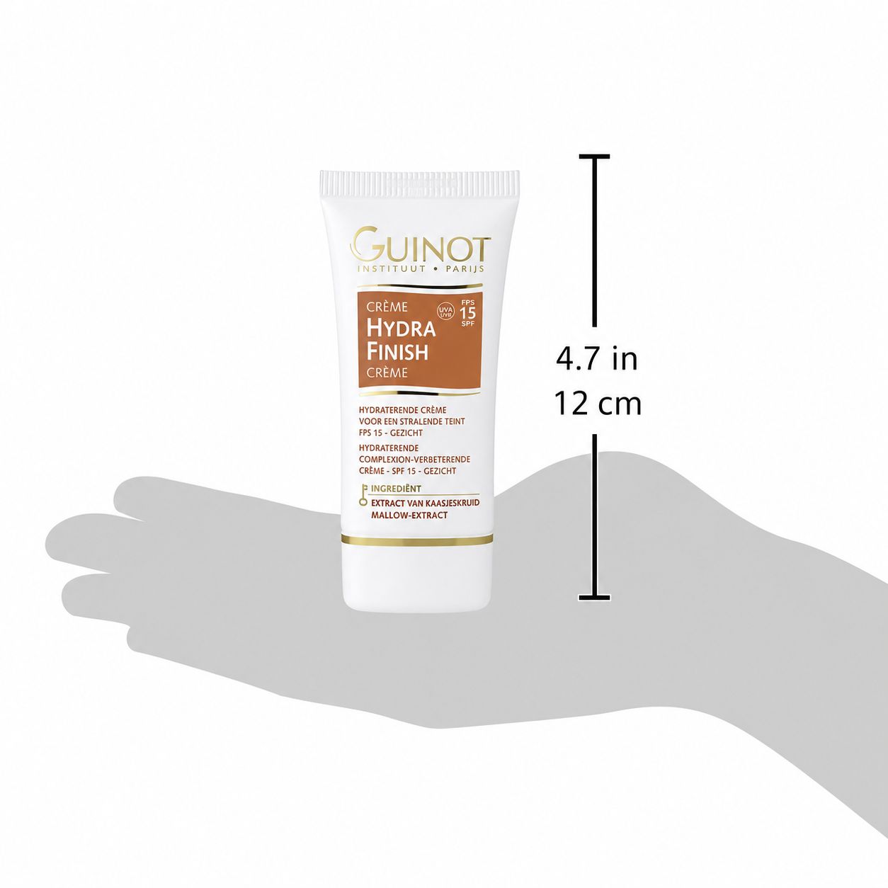 Guinot Hydra Finish Gezichtscrème LSF15 in een hand, 12 cm.