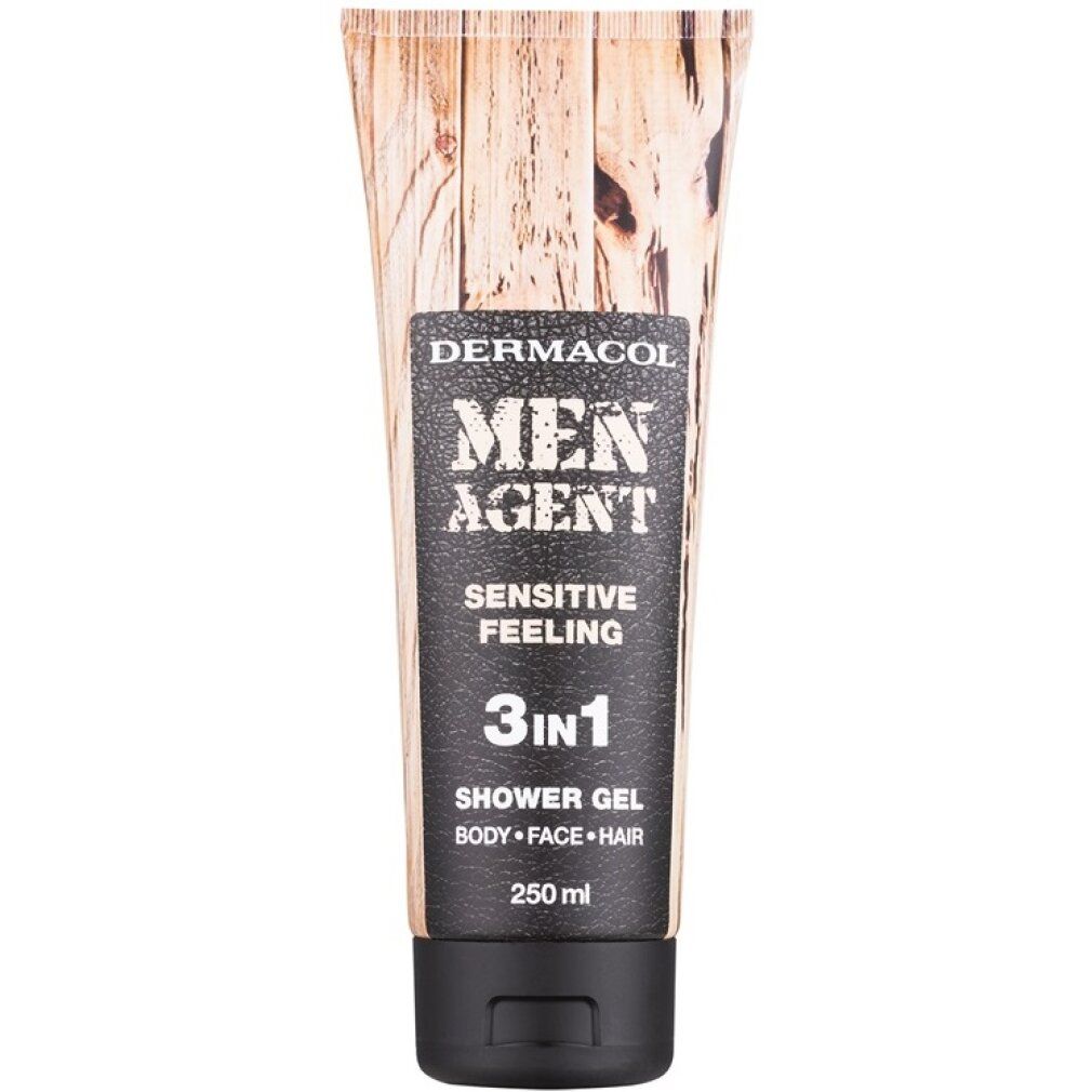 Tube de gel douche avec motif bois. Étiquette noire avec "MEN AGENT", "SENSITIVE FEELING" et "3in1".