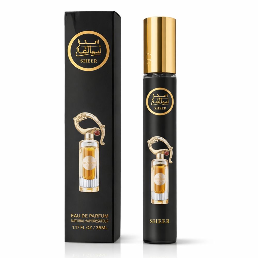 Zwarte flacon en doos. Gouden dop. Opschrift: Lattafa Sheer. Eau de Parfum. 1.17 FL OZ / 35ml.