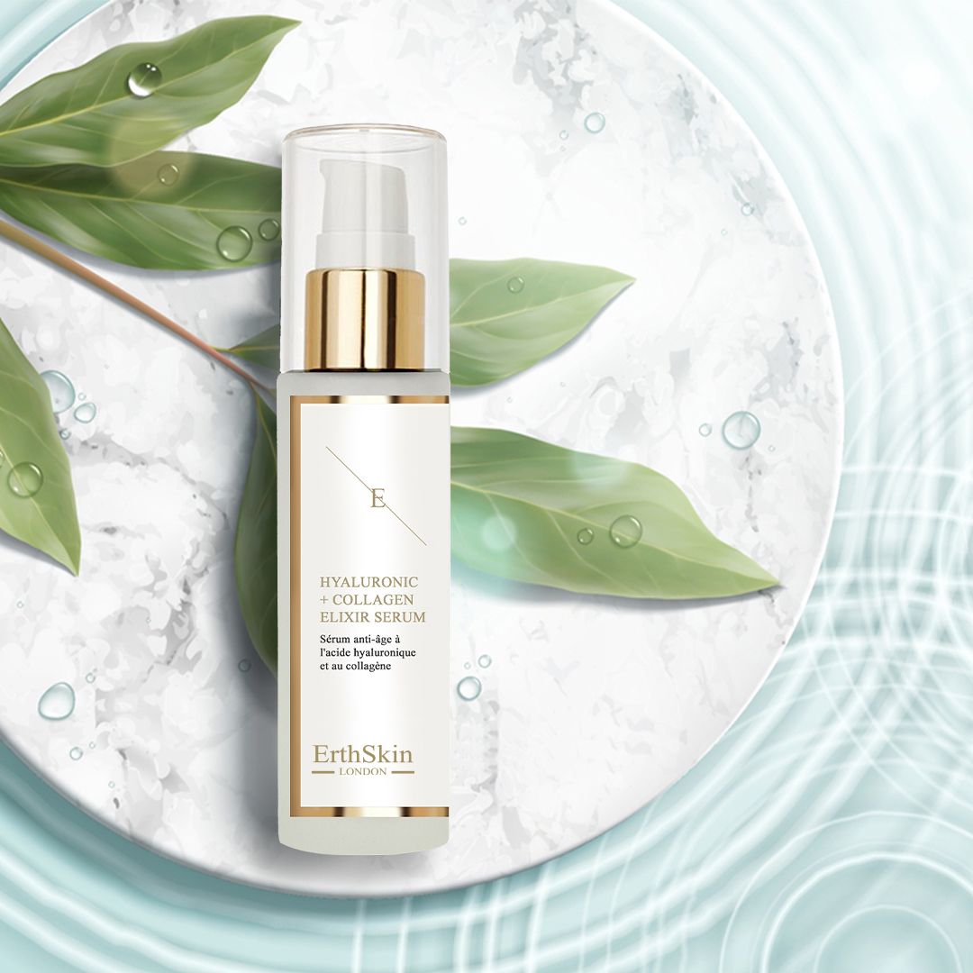 Sérum sur une assiette blanche avec des feuilles. Le sérum indique : Hyaluronic Acid + Collagen Elixir Serum.