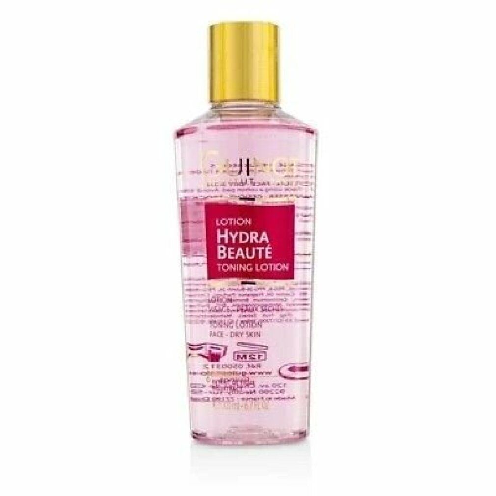 Guinot Hydra Beaute Lotion. Transparante fles met roze vloeistof, gouden dop. Rood etiket met productnaam.