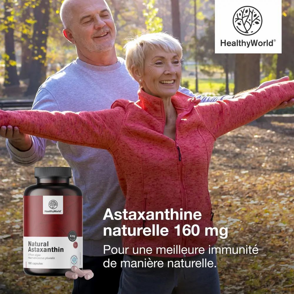 Femme et homme en extérieur. Flacon avec gélules. Inscription : Astaxanthine naturelle 160 mg. Marque : HealthyWorld.