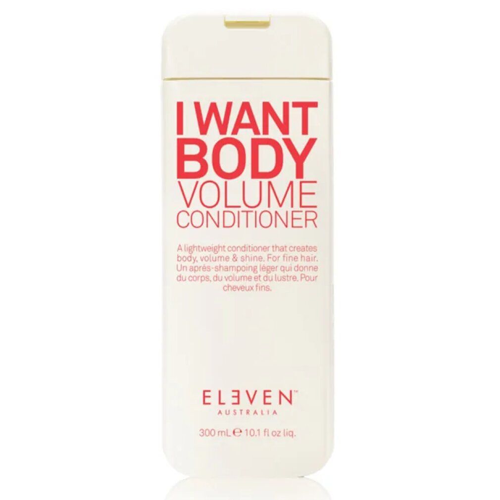 Beige conditionerfles met rode tekst: I WANT BODY VOLUME CONDITIONER. Merk: ELEVEN AUSTRALIA. 300 ml.