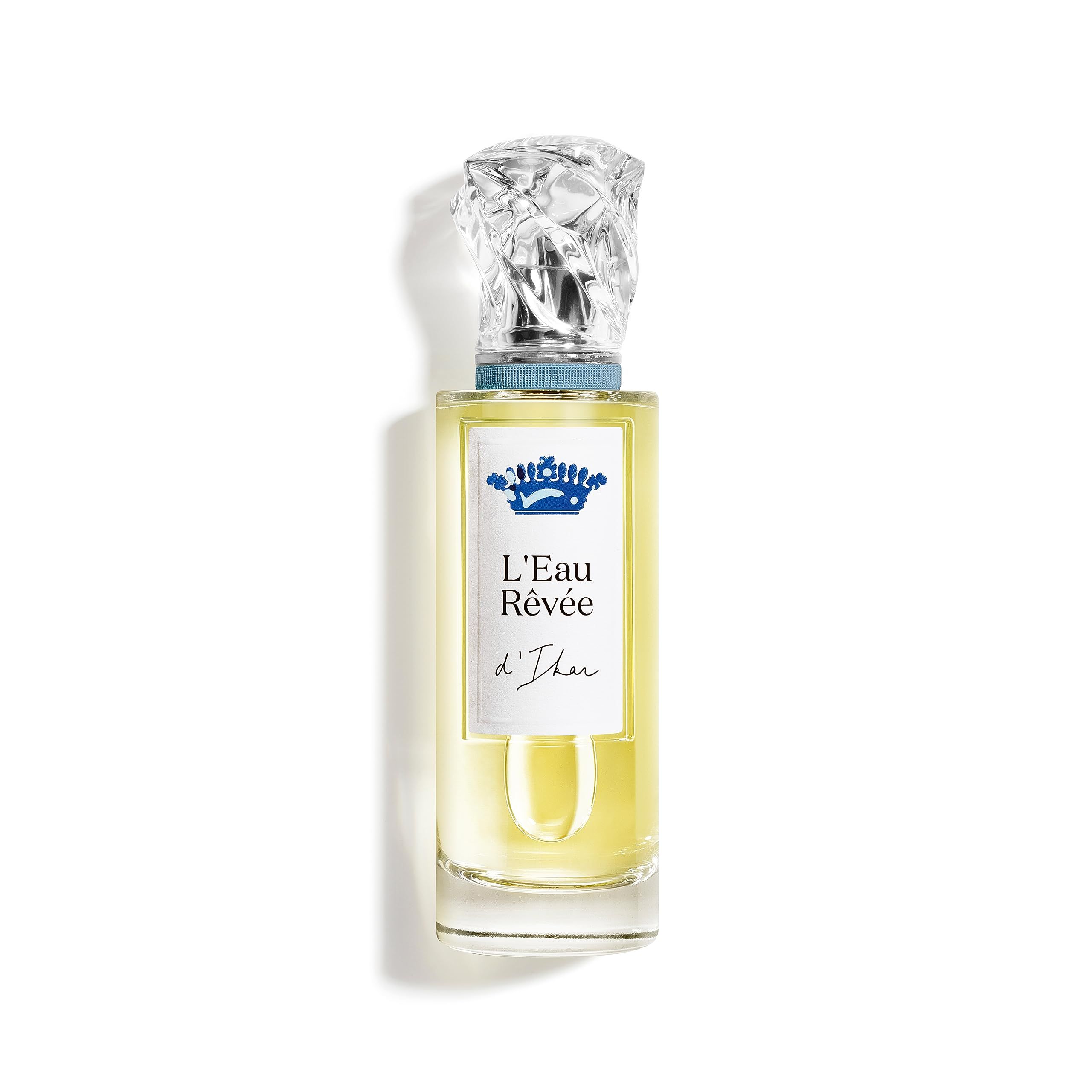 Flacon en verre avec liquide jaune. Bouchon transparent. Étiquette avec nom du produit: L'Eau Rêvée d'Ikar. Capuchon bleu.