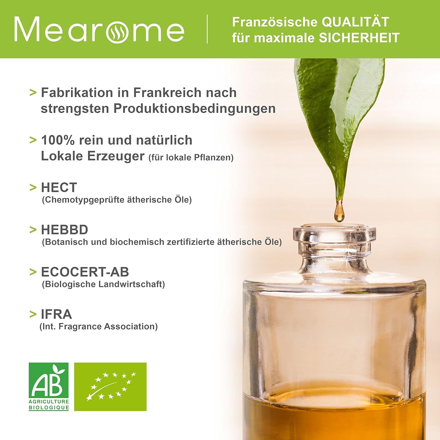 Productfles met tekst en certificeringen. Druppel olie. Groene bladeren.
