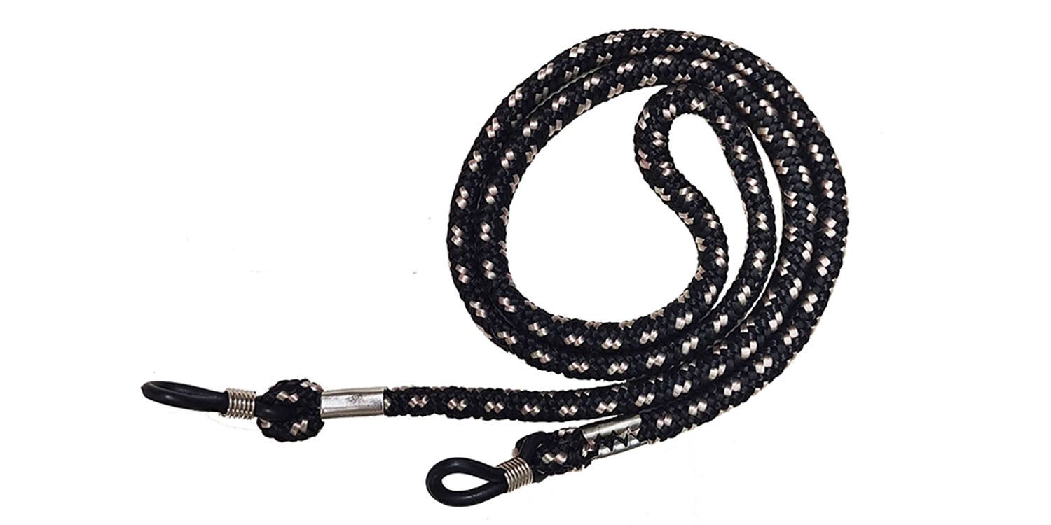 Brillenband, zwart-wit patroon. Lussen voor bevestiging aan brillenpoten. Metalen verbindingen.