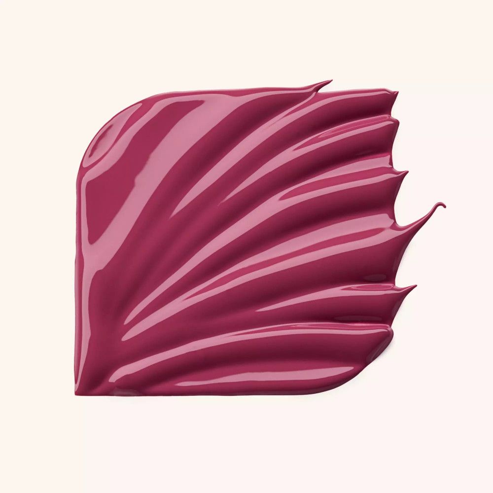 Échantillon de vernis à lèvres rose. Texture brillante.