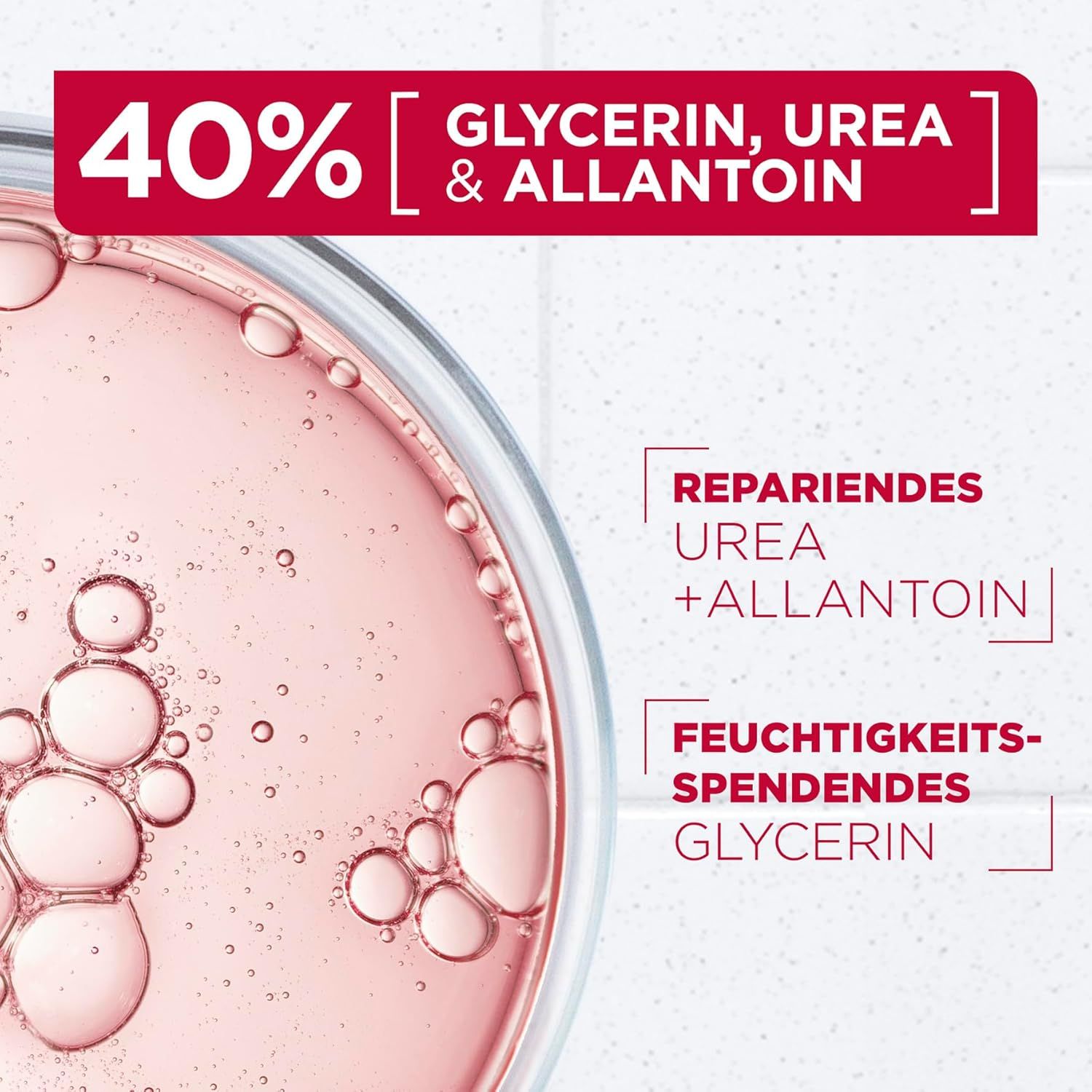 Close-up van vloeistof. Tekst: 40% Glycerine, Ureum & Allantoïne. Tekst: Herstellende Ureum + Allantoïne.