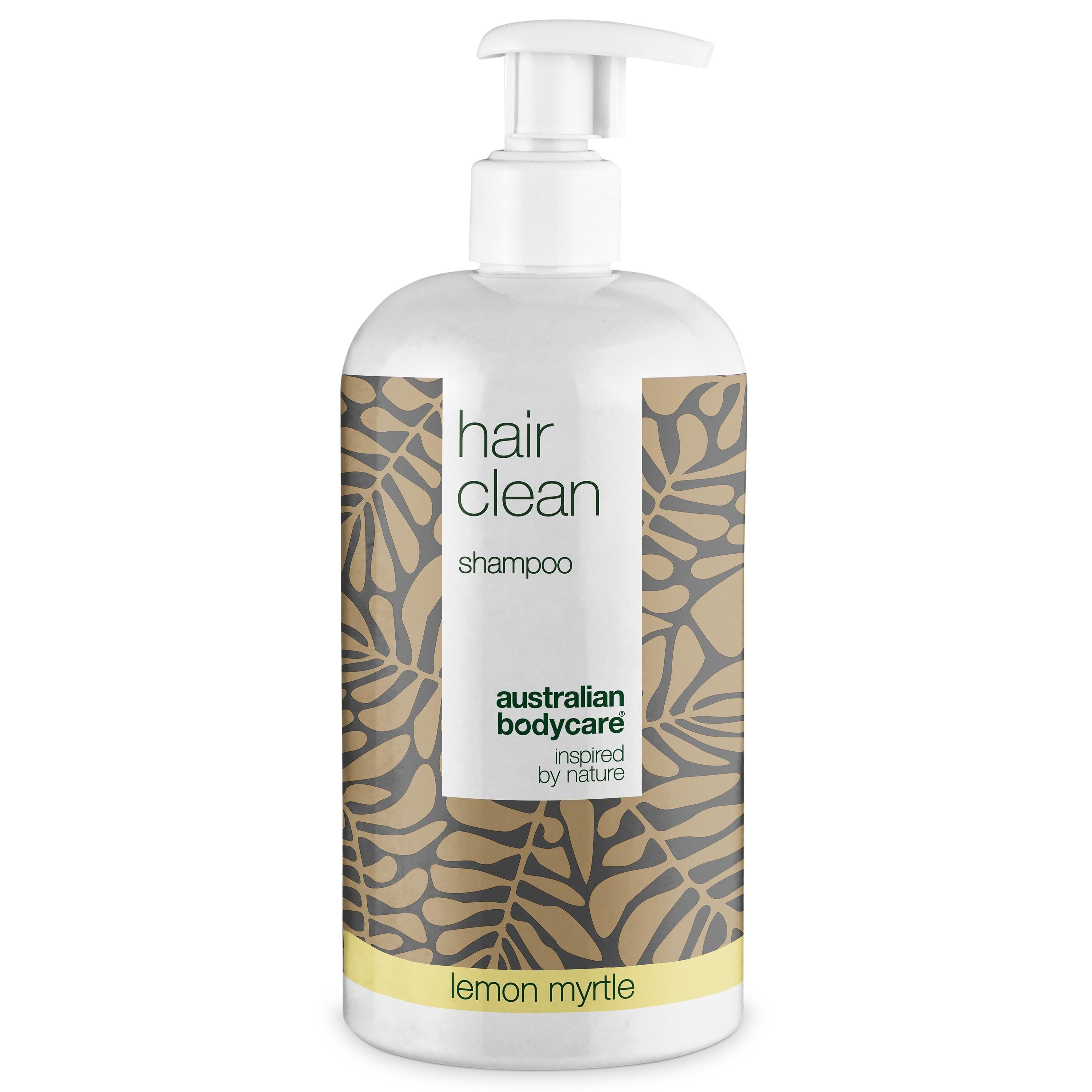Flacon blanc avec pompe. Étiquette "hair clean shampoo" et "lemon myrtle".