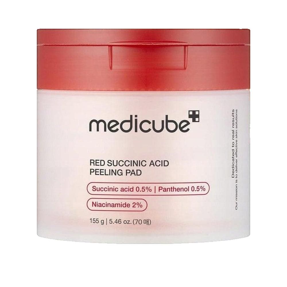 Ronde pot met rode deksel. Opschrift: medicube, Red Succinic Acid Peeling Pad. Ingrediënten: Succinic acid 0.5%, Panthenol 0.5%, Niacinamide 2%.