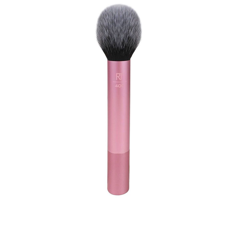 Pinceau à poudre avec manche rose et poils gris-noirs. "R 40" imprimé sur le manche.