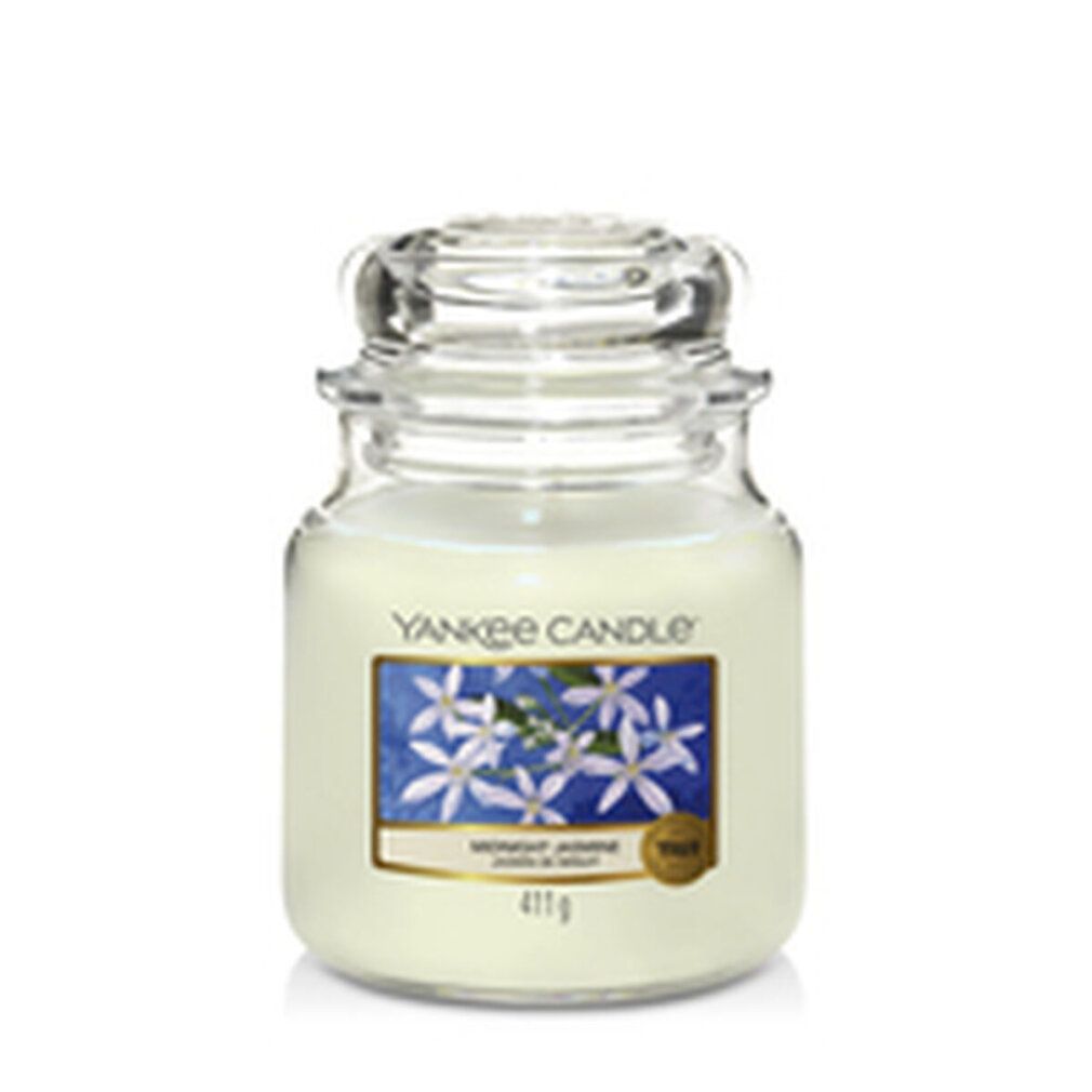Yankee Candle Midnight Jasmine geurkaars. Glazen pot met deksel. Blauw etiket met bloemen. Gewicht: 411g.