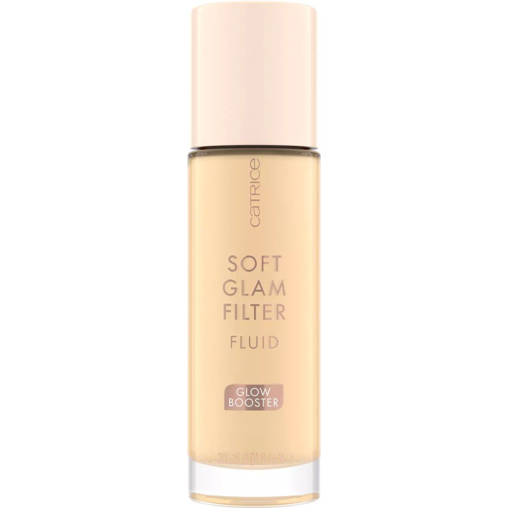 Flacon transparent avec bouchon beige. Inscription : Catrice, Soft Glam Filter Fluid, Glow Booster.