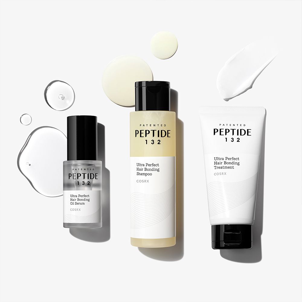 Sérum, shampoing et traitement COSRX Peptide 132 avec des gouttes.