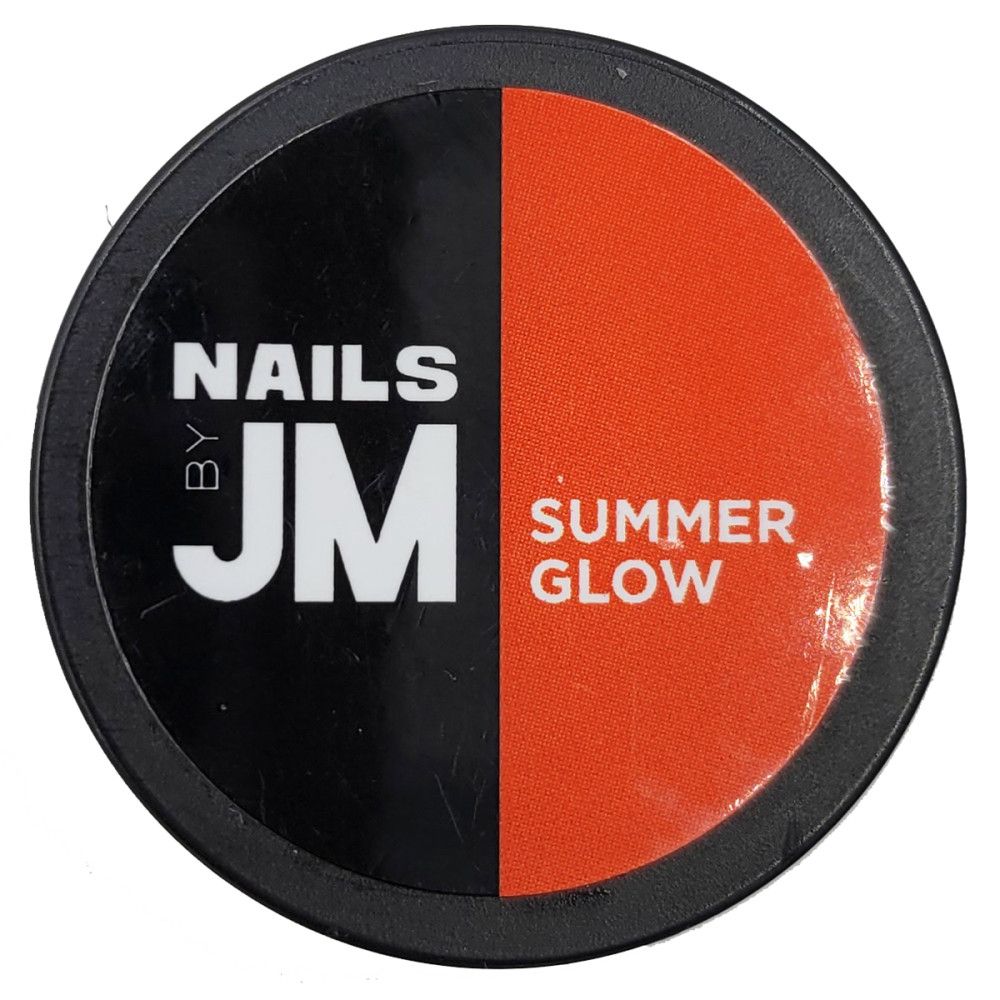 Contenant rond, divisé en noir et orange. Sur le noir, "NAILS BY JM" en blanc. Sur l'orange, "SUMMER GLOW".