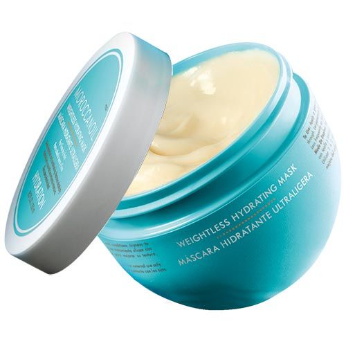 Turquoise en witte pot, deksel open. Opschrift: Moroccanoil, Weightless Hydrating Mask, Mascara Hidratante Ultraligera, Hydration.